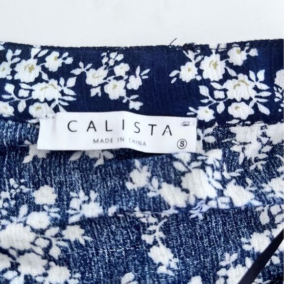 Calista Anthropologie Navy Blue Ditsy Floral Print Tiered Dress size Small - Picture 3 of 14